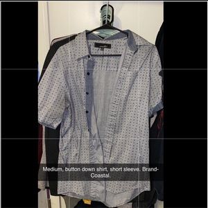 Men’s button down, short sleeve.